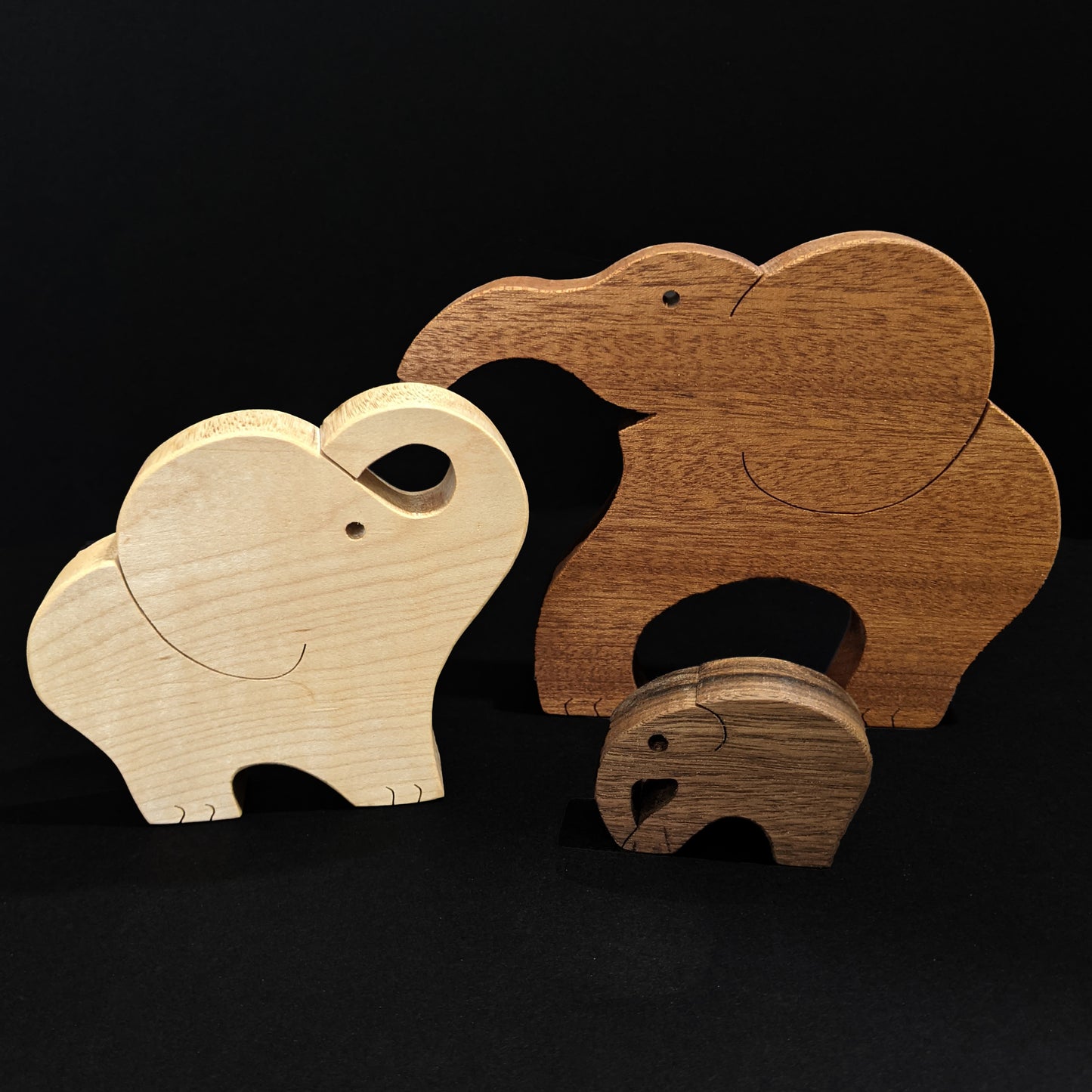 Cute Interlocking Elephant Family