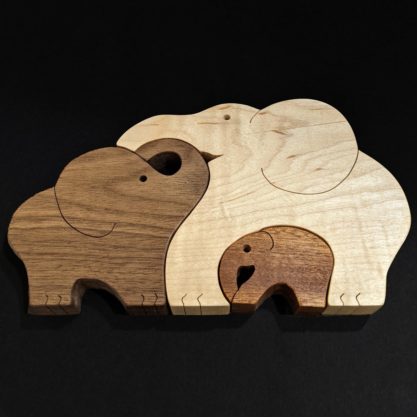 Cute Interlocking Elephant Family