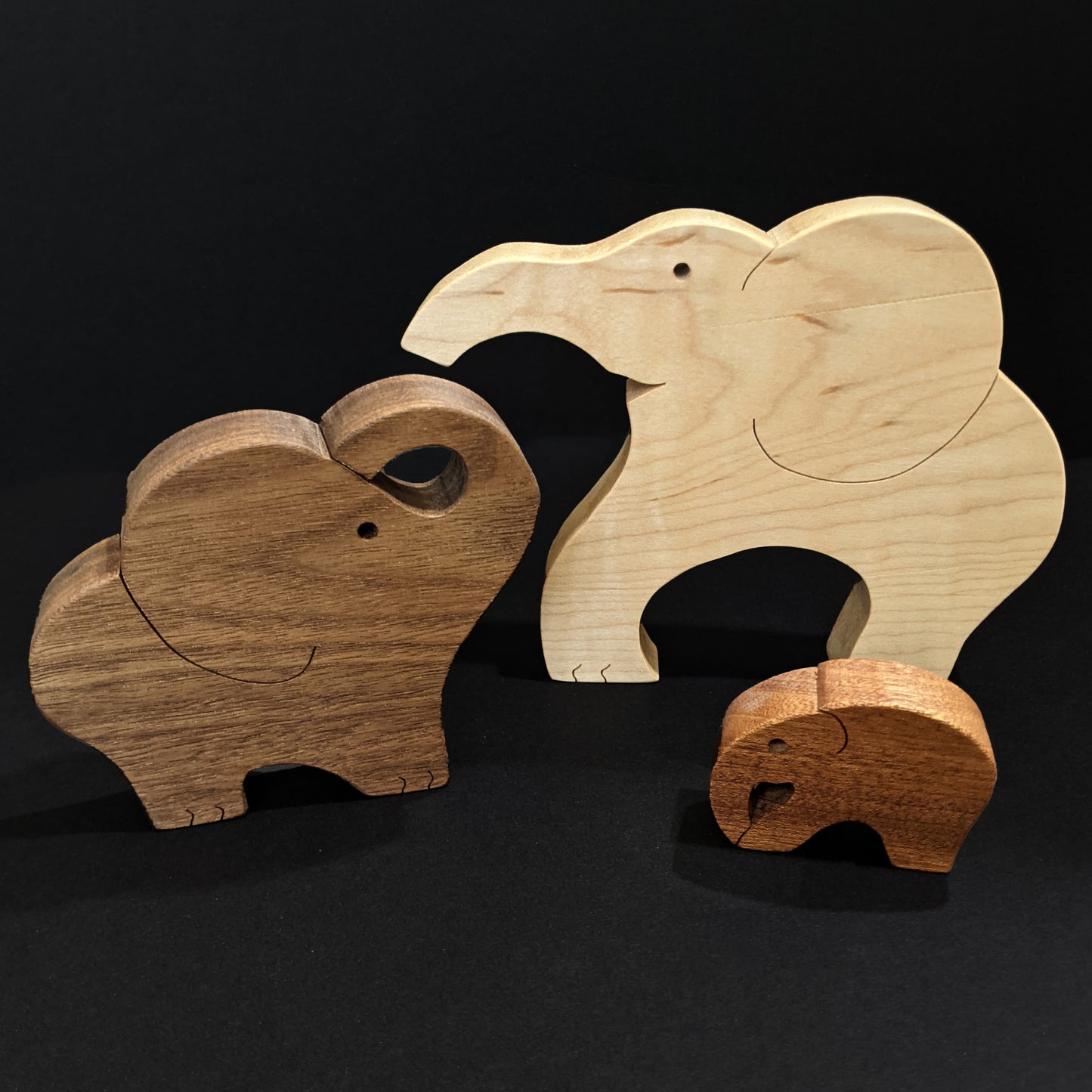Cute Interlocking Elephant Family