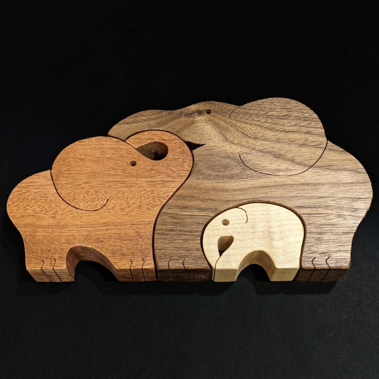 Cute Interlocking Elephant Family